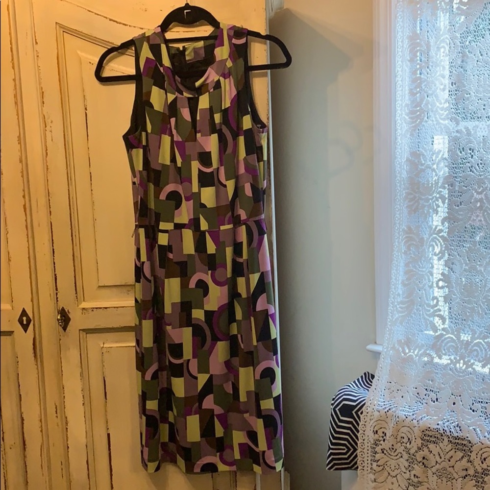 Tahari sleeveless dress. Comes without belt